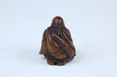 Lot 2233 - Six Japanese wood netsuke of seated figures,...