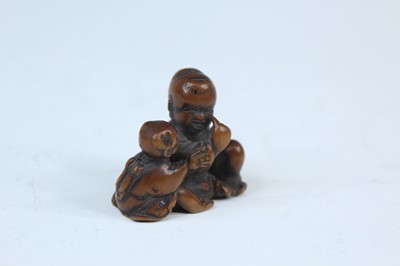 Lot 2233 - Six Japanese wood netsuke of seated figures,...