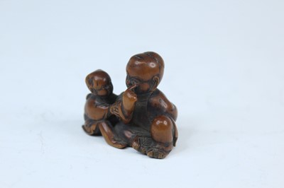 Lot 2233 - Six Japanese wood netsuke of seated figures,...