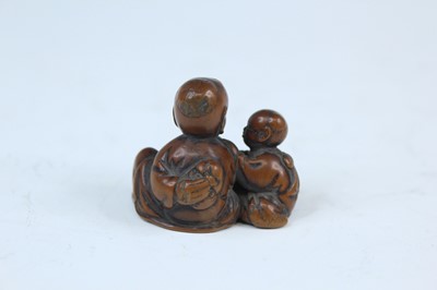 Lot 2233 - Six Japanese wood netsuke of seated figures,...