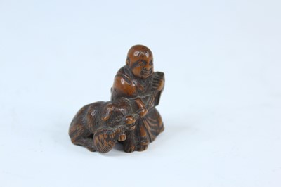 Lot 2233 - Six Japanese wood netsuke of seated figures,...