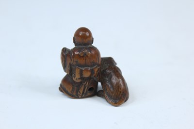 Lot 2233 - Six Japanese wood netsuke of seated figures,...