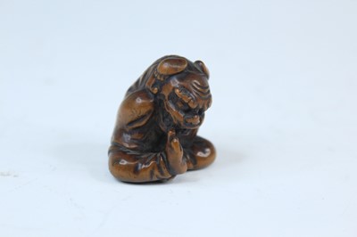 Lot 2233 - Six Japanese wood netsuke of seated figures,...