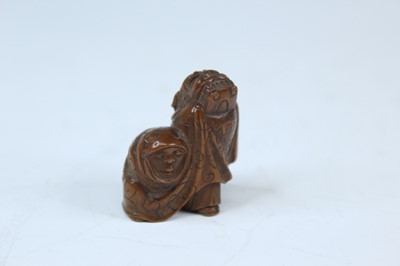 Lot 2233 - Six Japanese wood netsuke of seated figures,...