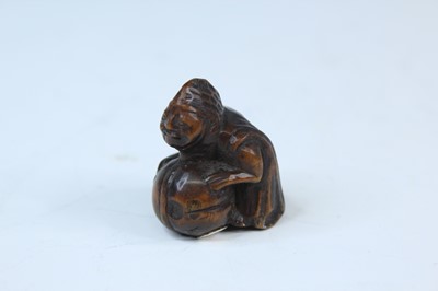Lot 2233 - Six Japanese wood netsuke of seated figures,...