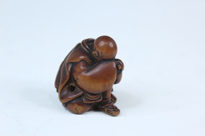 Lot 2233 - Six Japanese wood netsuke of seated figures,...