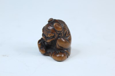 Lot 2233 - Six Japanese wood netsuke of seated figures,...