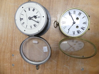 Lot 118 - A metal ship's clock by Kelvin & Hughes...