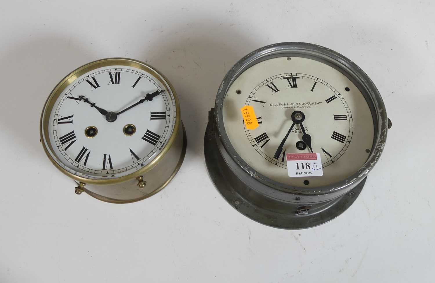 Lot 118 - A metal ship's clock by Kelvin & Hughes...
