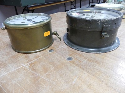 Lot 118 - A metal ship's clock by Kelvin & Hughes...