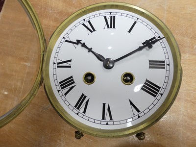 Lot 118 - A metal ship's clock by Kelvin & Hughes...
