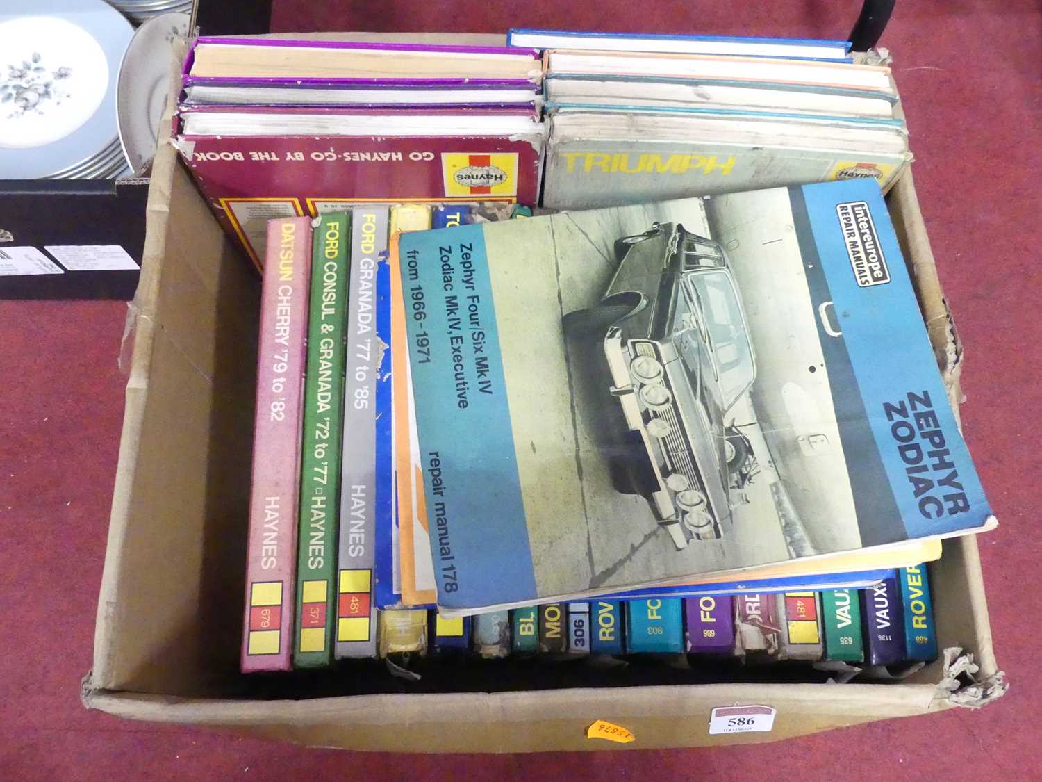 Lot 586 - A box of Haines car manuals, to include...
