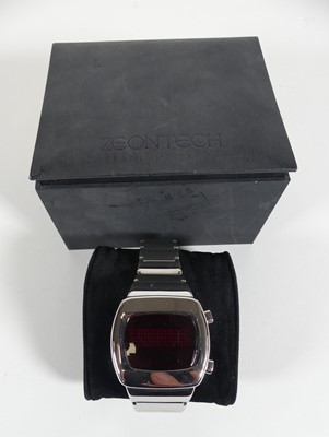 Lot 412 - A Zeon Tech chrome cased digital wristwatch on...