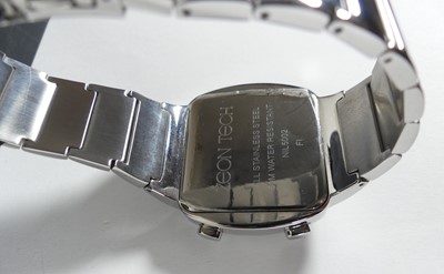Lot 412 - A Zeon Tech chrome cased digital wristwatch on...