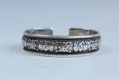 Lot 2061 - A Chinese silver bangle, late 19th to early...