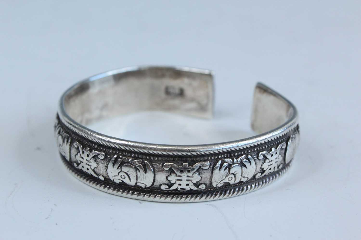 Lot 2061 - A Chinese silver bangle, late 19th to early...
