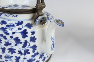 Lot 2026 - Two Chinese blue and white teapots with...