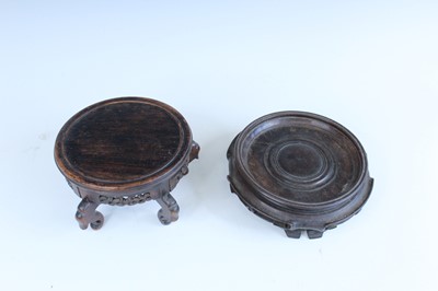 Lot 2094 - A group of Chinese wooden stands, comprising...