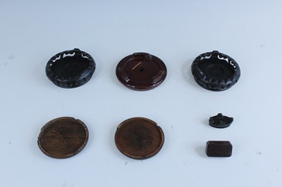 Lot 2094 - A group of Chinese wooden stands, comprising...