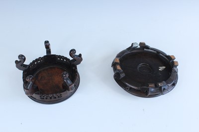 Lot 2094 - A group of Chinese wooden stands, comprising...