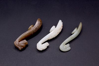 Lot 2047 - A group of six Chinese jade ornaments, Qing...