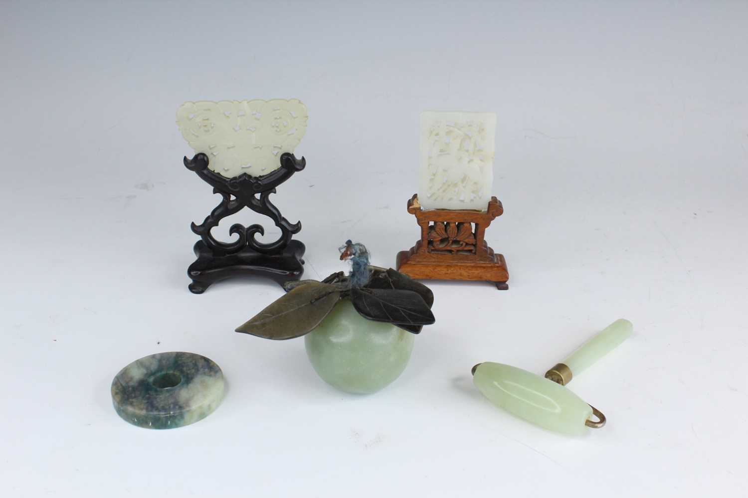 Lot 2049 - A group of five Chinese jade objects, 19th to...