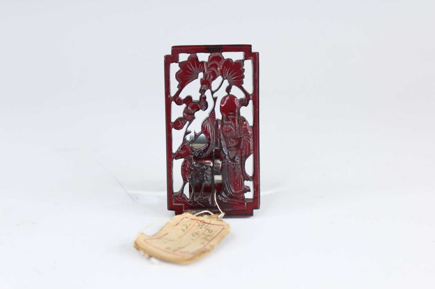 Lot 2051 - A Chinese carved amber ‘immortal and deer’...