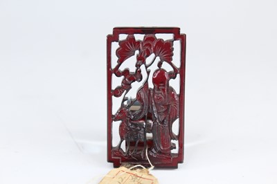 Lot 2051 - A Chinese carved amber ‘immortal and deer’...