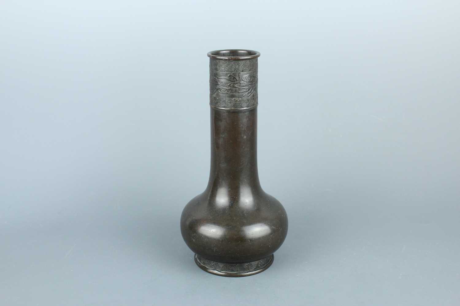 Lot 2069 - A Chinese bronze bottle vase, Qing Dynasty....