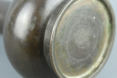 Lot 2069 - A Chinese bronze bottle vase, Qing Dynasty....