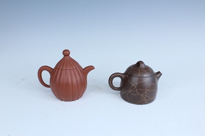 Lot 2055 - Two Chinese Yixing teapots, 20th century,...