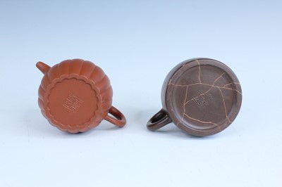 Lot 2055 - Two Chinese Yixing teapots, 20th century,...