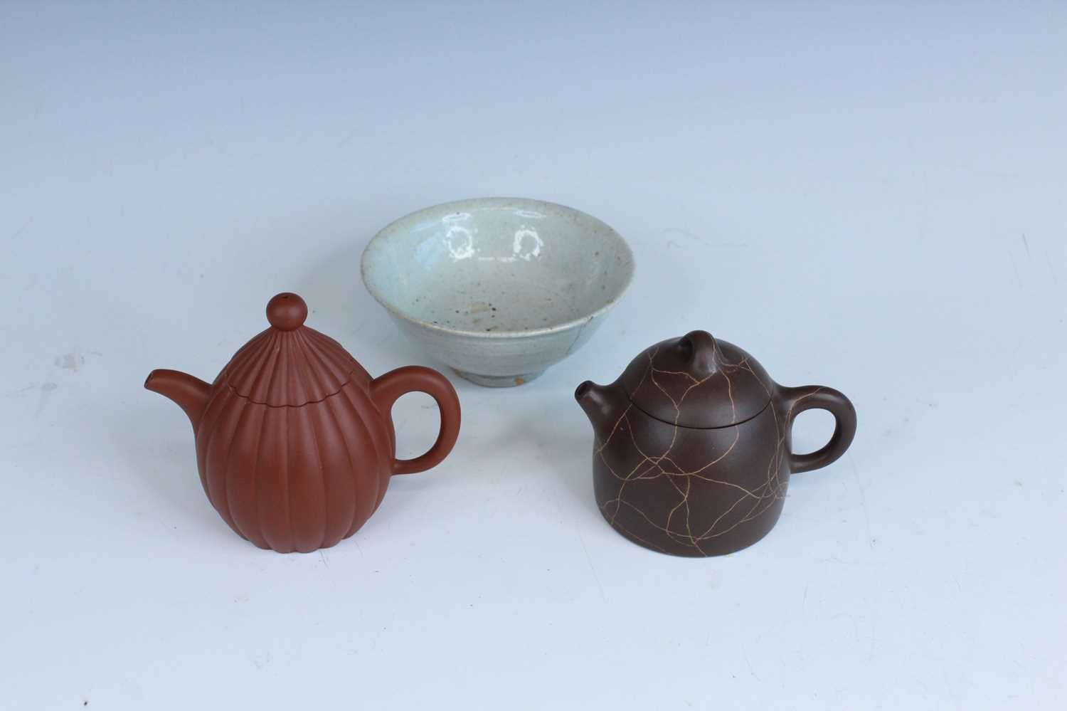 Lot 2055 - Two Chinese Yixing teapots, 20th century,...