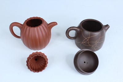 Lot 2055 - Two Chinese Yixing teapots, 20th century,...