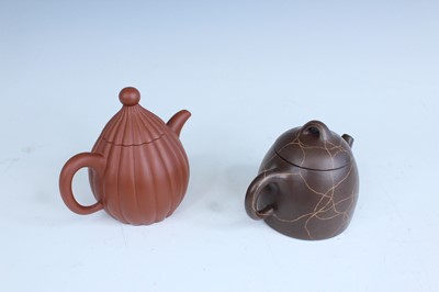Lot 2055 - Two Chinese Yixing teapots, 20th century,...