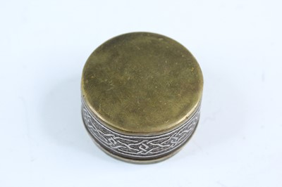 Lot 2215 - A small Persian brass-inlaid box, 19th or...