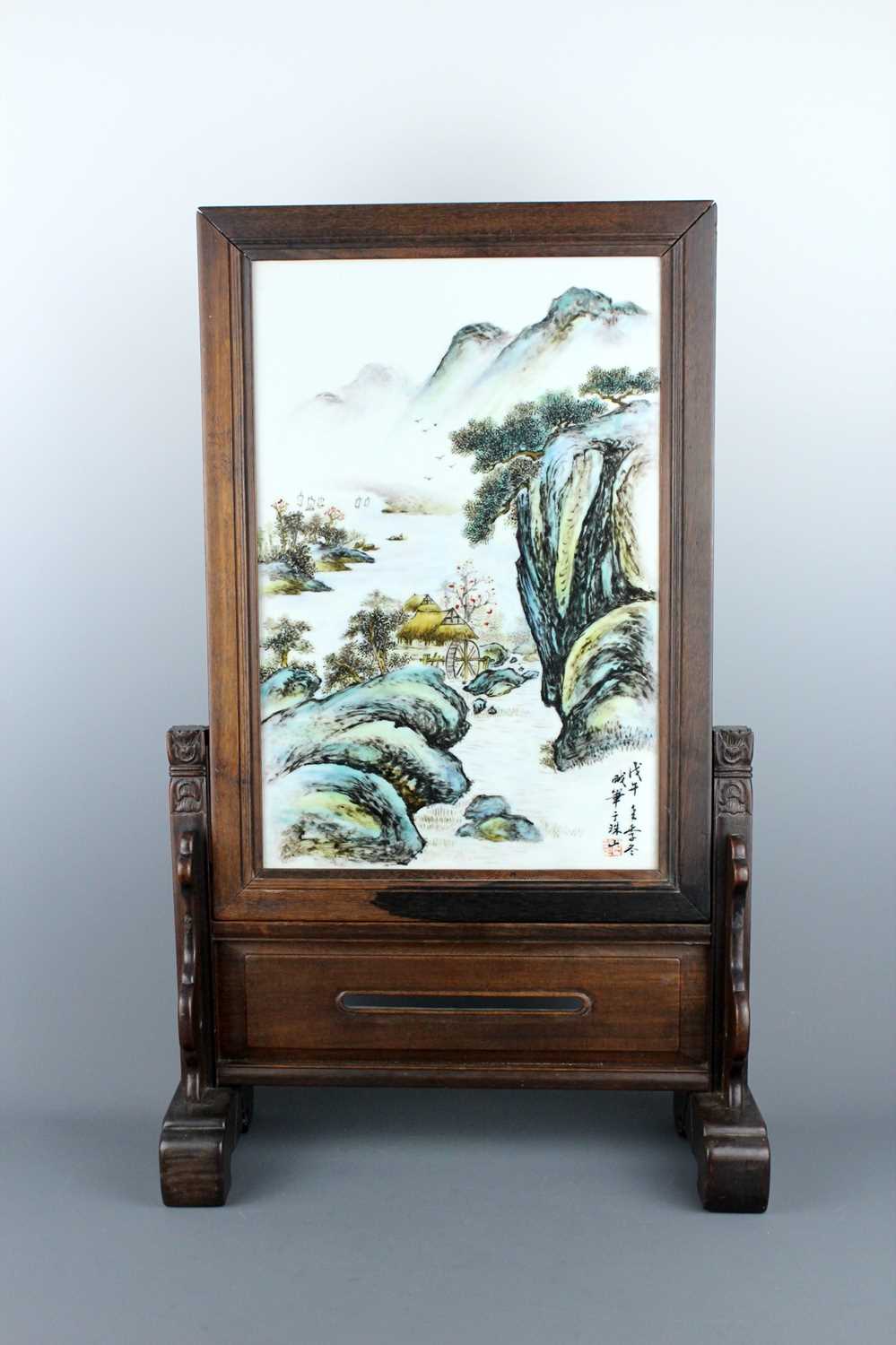 Lot 2096 - A Chinese hardwood table screen with an...