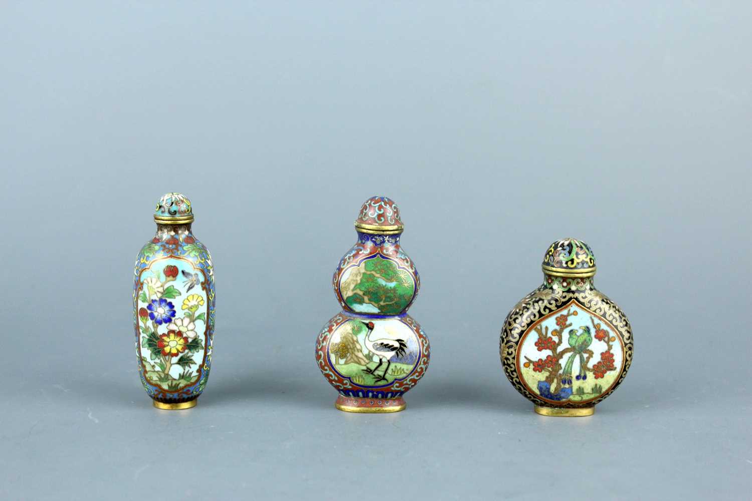 Lot 2008 - A set of three Chinese cloisonné enamel ‘birds...
