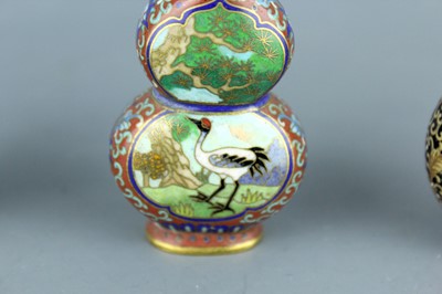 Lot 2008 - A set of three Chinese cloisonné enamel ‘birds...