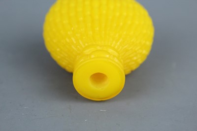 Lot 2009 - A Chinese yellow glass ‘willow basket’ snuff...