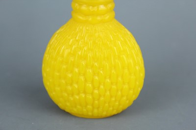 Lot 2009 - A Chinese yellow glass ‘willow basket’ snuff...
