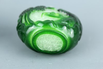 Lot 2012 - Two Chinese overlay glass snuff bottles, Qing...