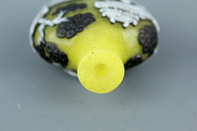 Lot 2012 - Two Chinese overlay glass snuff bottles, Qing...