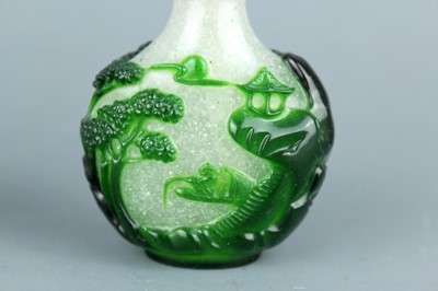 Lot 2012 - Two Chinese overlay glass snuff bottles, Qing...