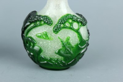 Lot 2012 - Two Chinese overlay glass snuff bottles, Qing...