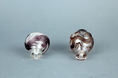Lot 2013 - Two Chinese ‘dragon and phenix’ glass snuff...