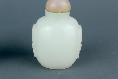 Lot 2016 - Two Chinese jade snuff bottles, Qing Dynasty,...