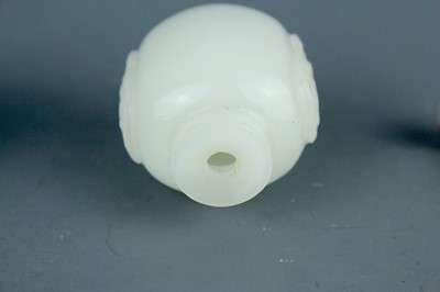 Lot 2016 - Two Chinese jade snuff bottles, Qing Dynasty,...