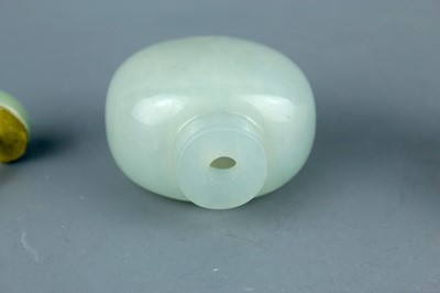 Lot 2016 - Two Chinese jade snuff bottles, Qing Dynasty,...