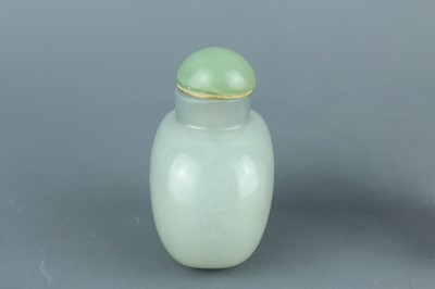 Lot 2016 - Two Chinese jade snuff bottles, Qing Dynasty,...